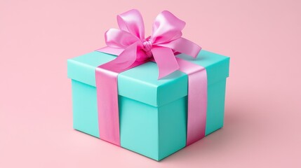 Light Teal Gift Box with Pink Ribbon Bow on Pink Background