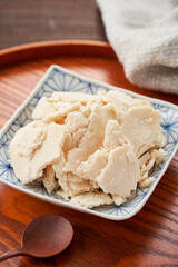 酒粕 - 日本の伝統的な発酵食品と健康食材のイメージ