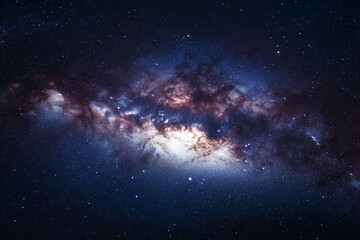 Fototapeta premium vast, star-filled sky with a large, glowing cloud of gas and dust. The stars are scattered throughout the sky, with some closer together and others more spread out