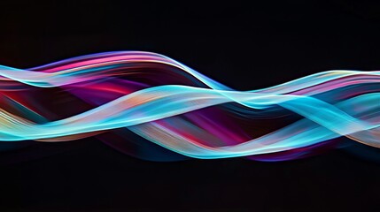 Obraz premium Abstract swirling light patterns in vibrant pink, blue, and purple hues on a black background. The image evokes a sense of movement and energy