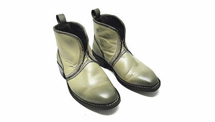 Light beige boots on white background