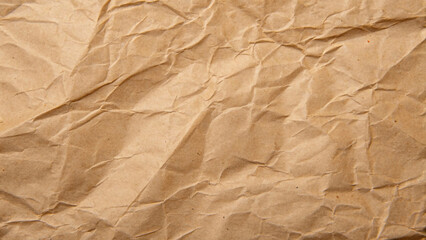 Abstract crumpled and creased recycleantique, ancient, parchment, retro, dirty, rustic, stained, vintage. brown paper texture background