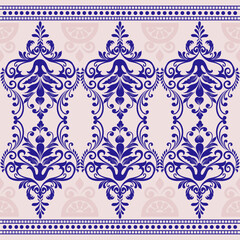 Bold damask pattern in vibrant royal blue with detailed floral motifs on a pale pink backdrop. Ideal for textiles, stationery, home decor, event design, and luxurious branding projects.
