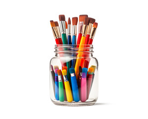 Fototapeta premium Jar of colorful paintbrushes on a transparent background