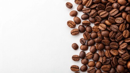 Naklejka premium Roasted Coffee Beans on White Background with Copy Space