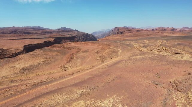 View of diverse landscapes across Saudi Arabia, showcasing vast deserts and towering mountains