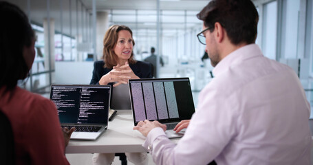 Diverse Team of Business People Coding