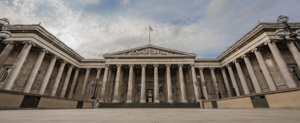 British Museum neoclassical facade stands tall with iconic columns and a balanced design, symbolizing its rich history.