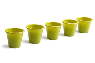 Five Lime Green Plastic Cups Arranged in a Row