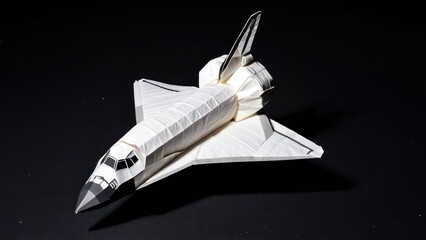 A stunning origami representation of a space shuttle showcases intricate craftsmanship