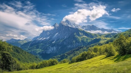 Fototapeta premium Dramatic Mountain Range with Green Valleys and a Vibrant Blue Sky