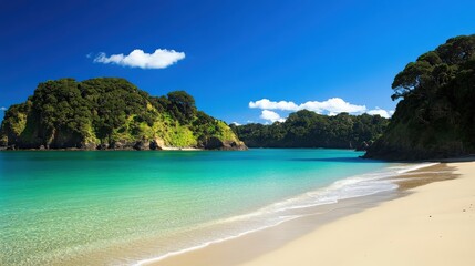 Fototapeta premium Beautiful Tropical Beach Scene with Clear Turquoise Water and Lush Green Hills