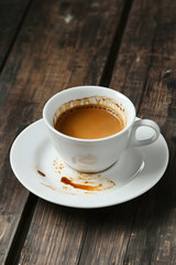 Rustic Coffee Break, An Espresso Cup on a Weathered Wood Table, Featuring Rich Textures and Warm Tones, Evoking a Cozy and Authentic Feel for Coffee Culture