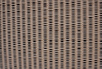 Woven Texture of Old Wicker: A Detailed Abstract Pattern Capturing the Essence of Woven Wicker in Shades of Brown, Grey, Beige, and Black, Ideal for Creating Organic and Textural Designs.

