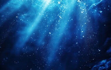 Deep Blue Ocean with Sunlight Rays Illuminating the Underwater Scene Filled with Bubbles and Particles in a Calm and Tranquil Marine Environment