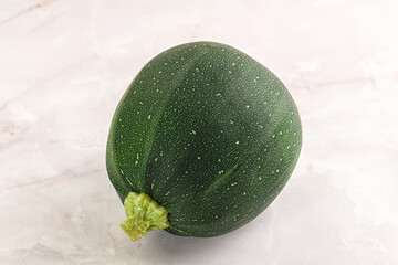 Raw green round zucchini vegetable