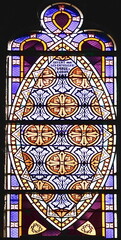 Window inside the Church of Notre Dame in Pontorson in Normandy, France