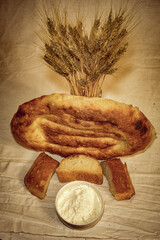Wheat ears, bread and flour, still life, bakery products