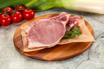 Raw pork steak loin with bone