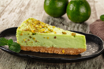 Green pistachio cheesecake served mint