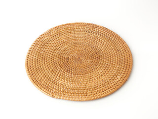 Round Rattan Wicker Placemat in an Isolated Setting With a Clean Aesthetic and Natural Texture
