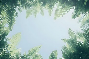 Obraz premium Lush Green Palm Fronds Frame Blue Sky