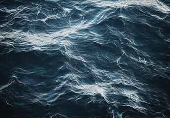 Fototapeta premium Serene Deep Blue Ocean Waves with Sunlight Reflection and Gentle Ripples in an Expansive Seascape for Nature and Travel Themes