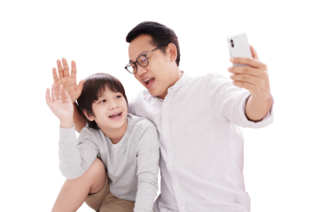 Smiling Asian father and little boy son selfie together with smartphone. Family activities and child