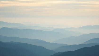 Fototapeta premium Misty mountain ranges, layered blue hills, hazy horizon, soft pastel colors, ethereal landscape, dreamy atmosphere, minimalist scenery, tranquil vista, distant peaks, gradient sky