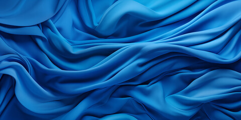 Fototapeta premium Blue fabric. Crumpled silk fabric. Light blue background. New pleated fabric