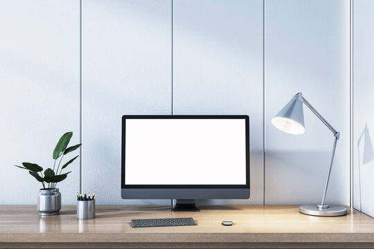 Modern Office Desk Setup with Computer Screen and Lamp. 3D Rendering