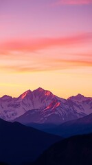 Fototapeta premium A High-Resolution Digital Wallpaper Featuring A Majestic Mountain Range At Sunset, Rendered In Vibrant Hues Of Orange, Pink, And Purple, With A Soft Focus Effect Creating A Dreamy At.