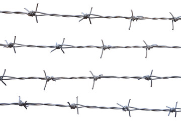 The barbed wire fence lined with sharp metal spikes and twisted barbwire, marks the border between freedom and confinement isolated.