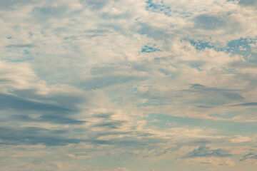 small white clouds on the blue sky.