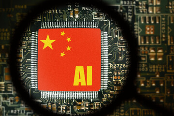 Flag of China on a processor with word AI. Computer board with chip. View through magnifying glass