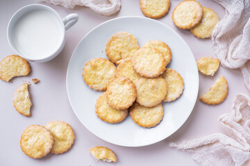 Sugar cookies on a white plate for breakfast. Delicious cookies for dessert. View from above. Close-up