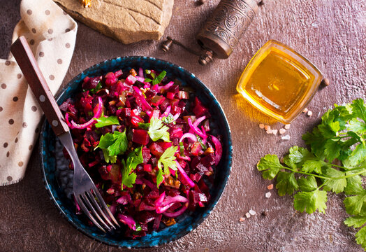 Traditional russian vegan salad with potato and beetroot