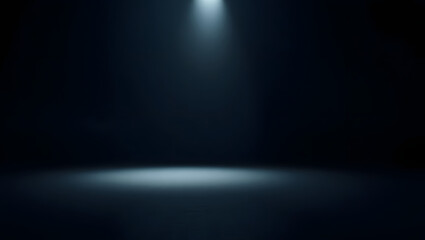 a dark studio interior illuminated by a single spotlight creating a dramatic atmosphere