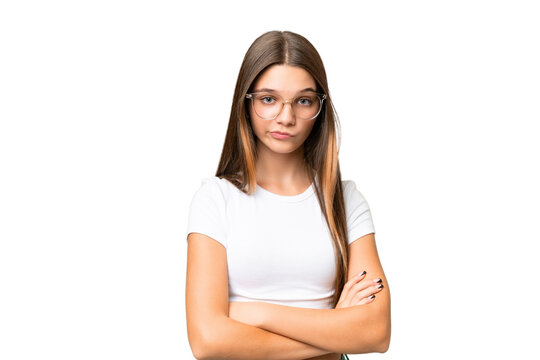 Teenager caucasian girl over isolated background feeling upset