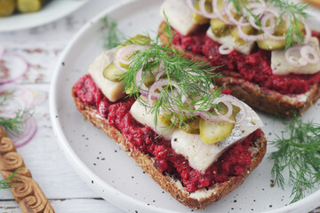Scandinavian sandwiches with herring and beetroot