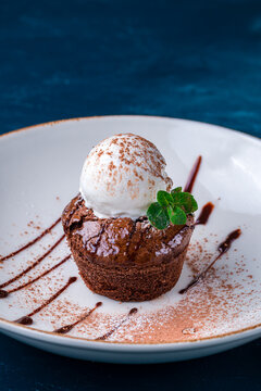 hot chocolate dessert fondant with ice cream, hot chocolate pudding with vanilla ice cream ball