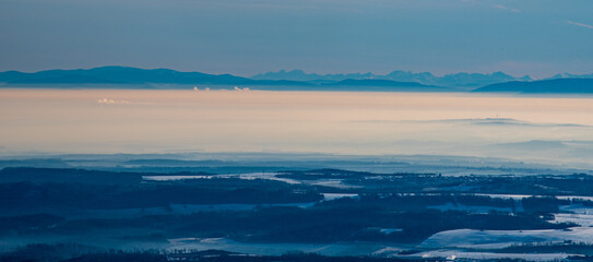 Tatra mountains and Beskid Slaski mountains from Praded hill in winter Jeseniky mountains in Czech republic