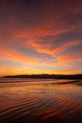Scenic sunset over sea, Pacific Beach, Playa Venao, Panama - stock photo