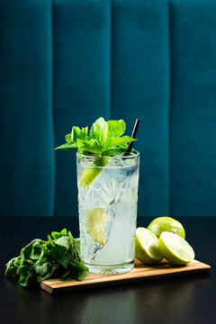 Cold fresh lemonade drink on a wooden table