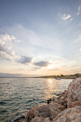 Bay with a small harbor, in the morning. Beautiful sunrise on the Mediterranean Sea. Mediterranean coast and landscape Beach Plaža Lozice on the island of Vir, Zadar, Dalmatia, Adriatic Sea, Croatia