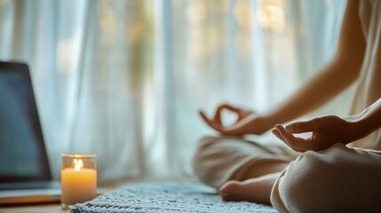Soft light filters through sheer curtains onto a person meditating on a mat, with a glowing candle and laptop subtly suggesting a guided session, creating a calming, mindful atmosphere