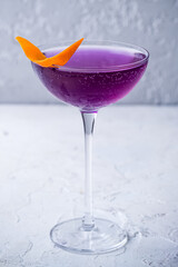 Purple Gin Tonic Cocktail with orange