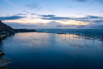 Beautiful dawn view at Bogey Hole, Newcastle, Australia.