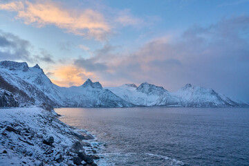 moody winter landscape of the Bergsbotn Bay,  part of the Northfjord on Senja Island, in Northern Norway