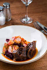 tender beef cheek with new potatoes